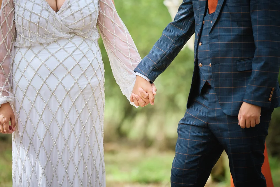 Joined hands during the outdoor ceremony